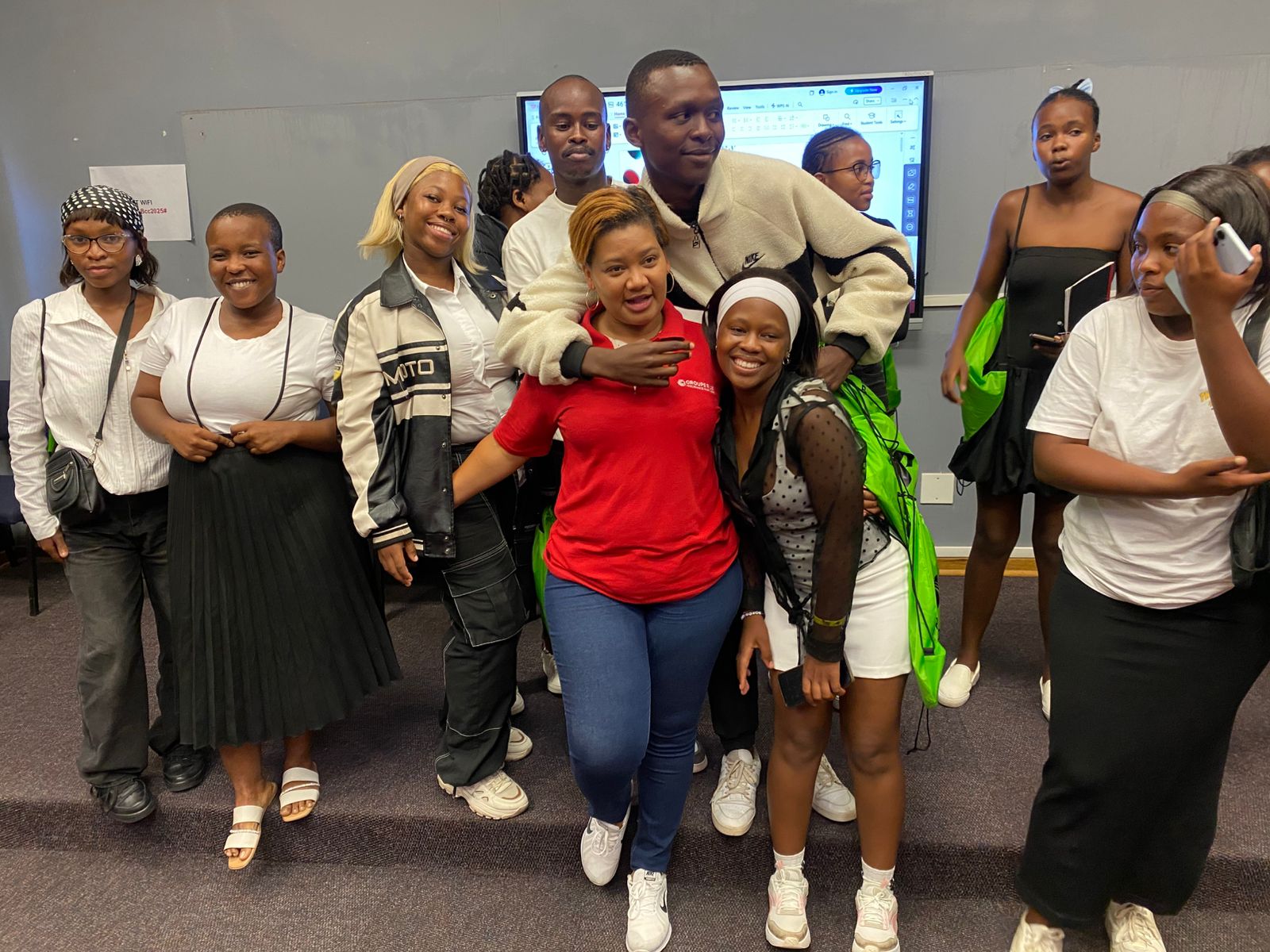 Youth group celebrating together at a workshop