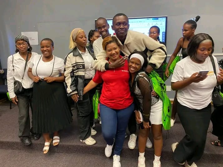 Youth participants posing together after a session